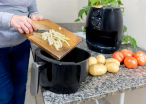 Adding prepared food to the air fryer basket