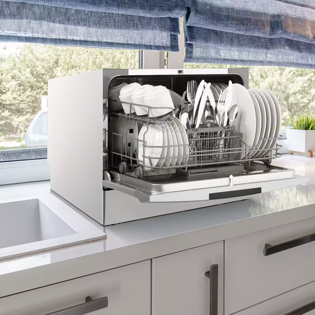 opened-countertop-dishwasher-with-dishes