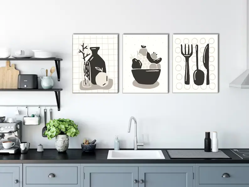Apartment kitchen with kitchen-themed art