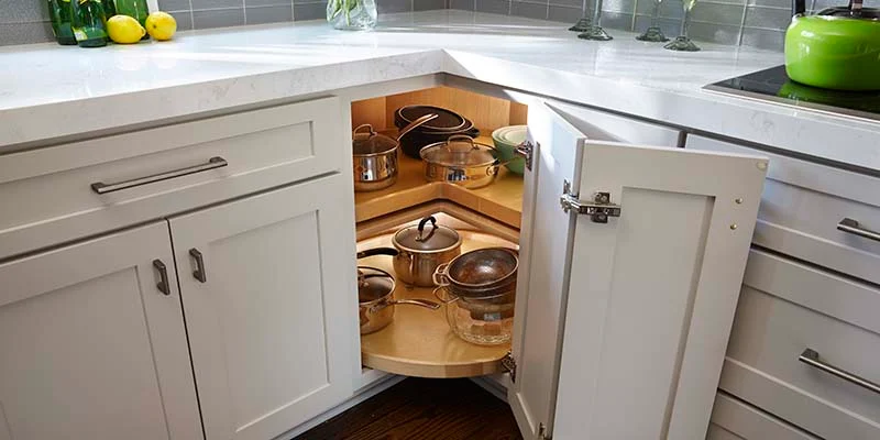 a close look of a Small kitchen with optimized corner corner cabinet