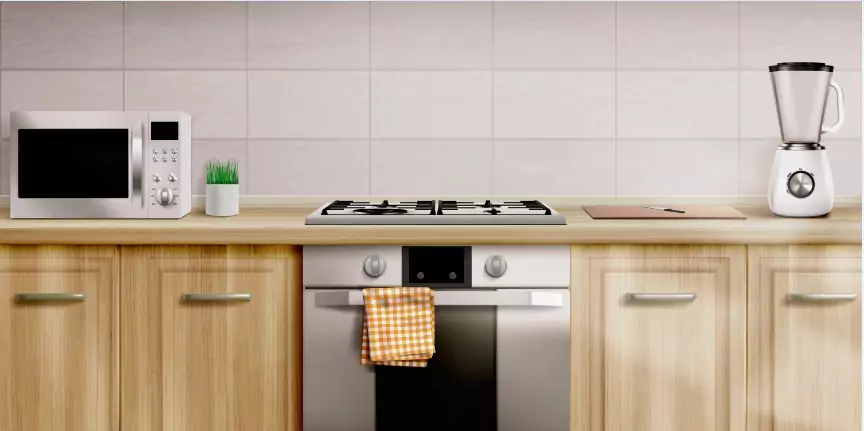 Kitchen counter top with microwave oven, gas stove and a blender