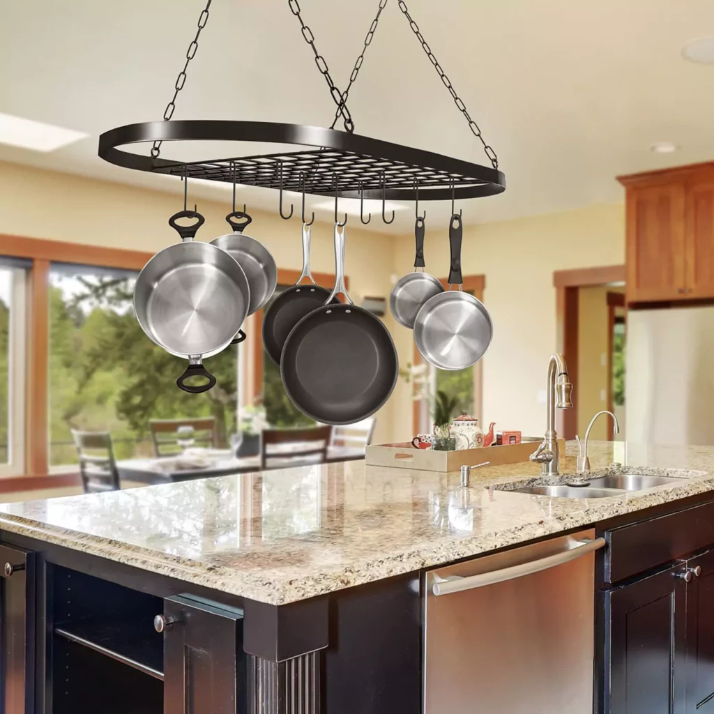 A hanging pot holder in a kitchen, installed above the kitchen island