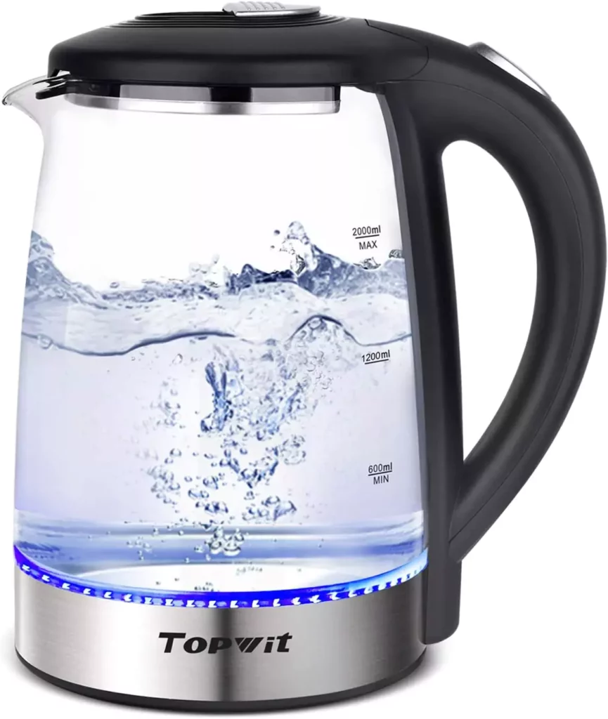 A TOPWIT 2.0 Liter Electric Kettle with a clear body filled with water, marked with measurement levels, and a black handle. The kettle is illuminated from the bottom with a blue light.