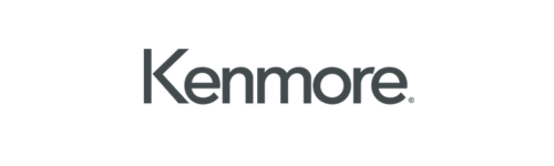 The image depicts the Kenmore logo. It features the brand name “Kenmore” written in an elegant, black, sans-serif font against a white background. The font is sleek and modern, with clean lines and sharp edges. A registered trademark symbol (®) appears at the upper right corner of the word1