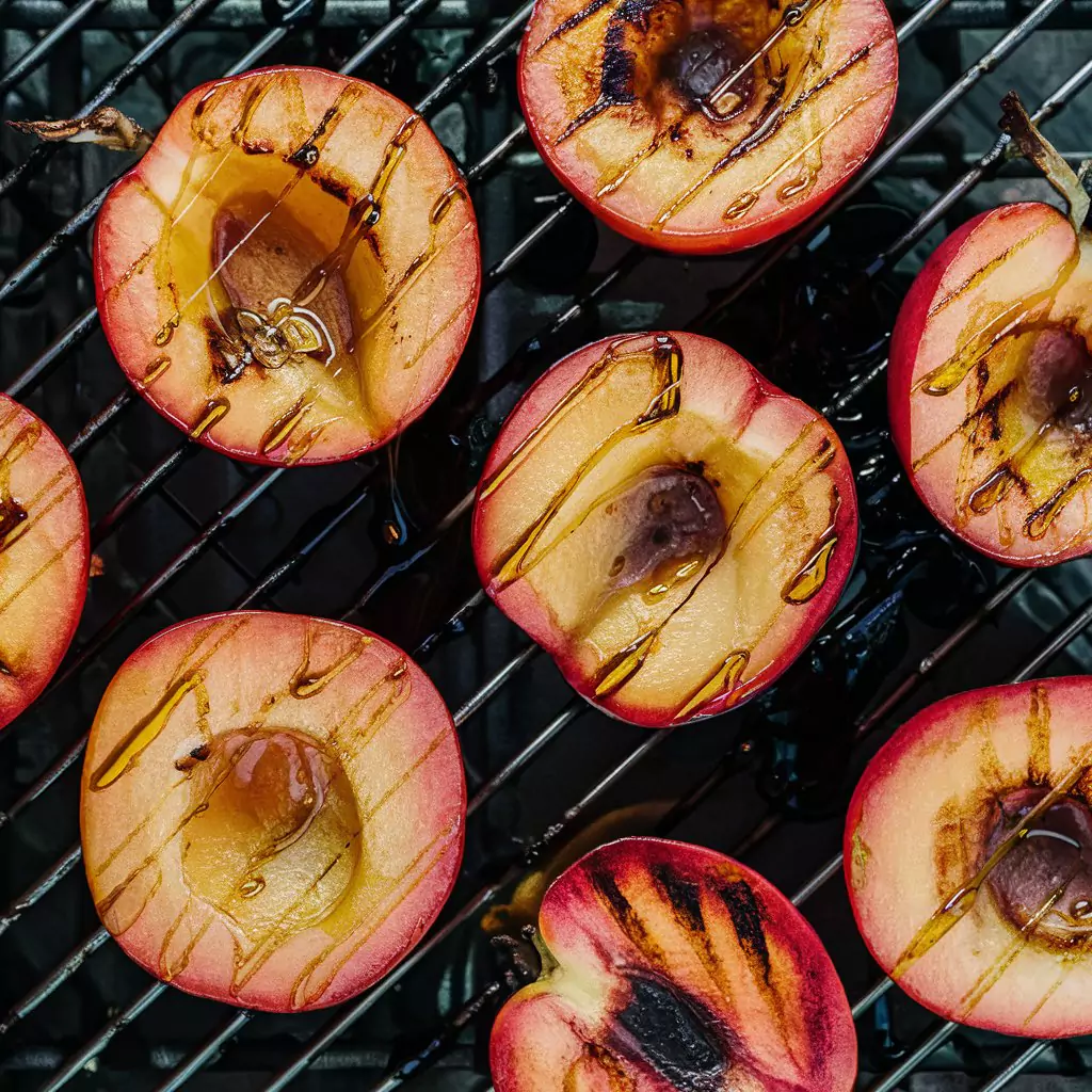 Grilled nectarine halves with honey drizzle.