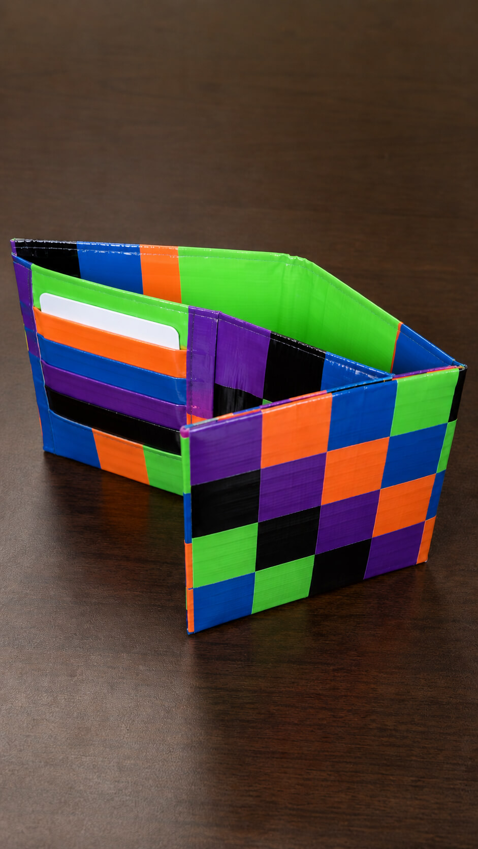 Colorful duct tape wallet on wood