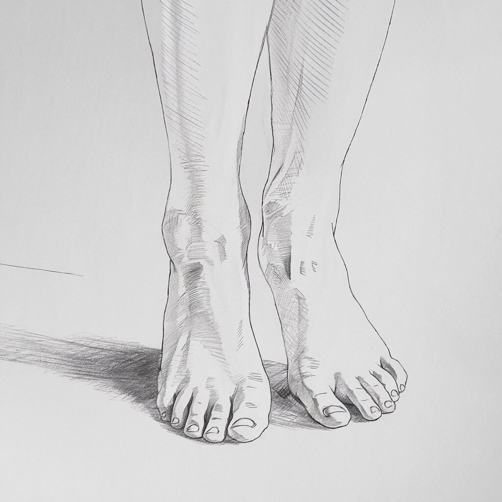 A pencil drawing of bare legs and feet with a plain white background. The feet are slightly flexed, and the toes are individually drawn to highlight natural variations. The skin has fine lines to depict texture, and light shading emphasizes the curves and contours of the ankles and arches. The drawing is in a simplistic style, focusing on authenticity and anatomical accuracy within the minimalist framework.