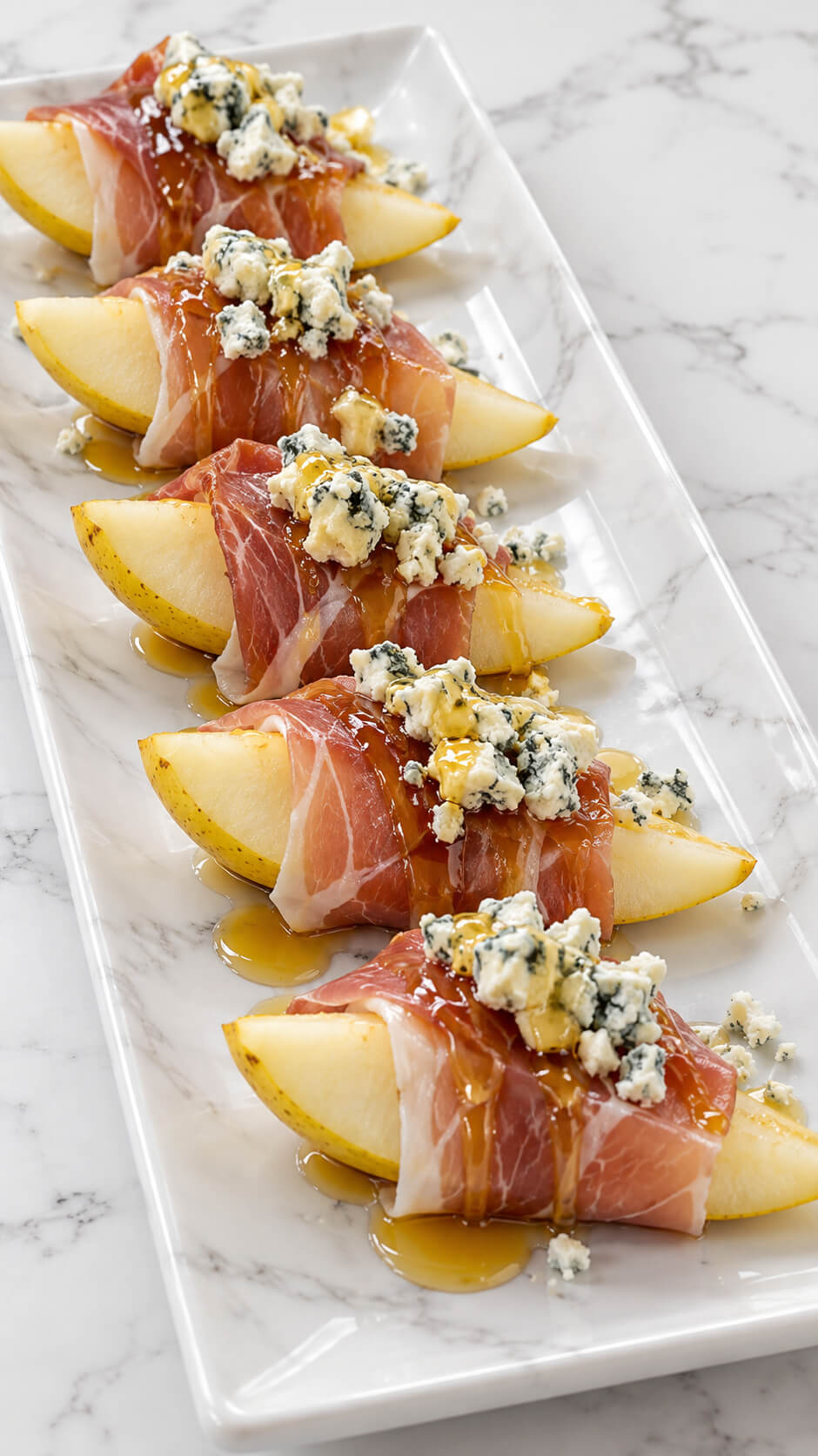 Honey Drizzled Pear and Prosciutto Bites