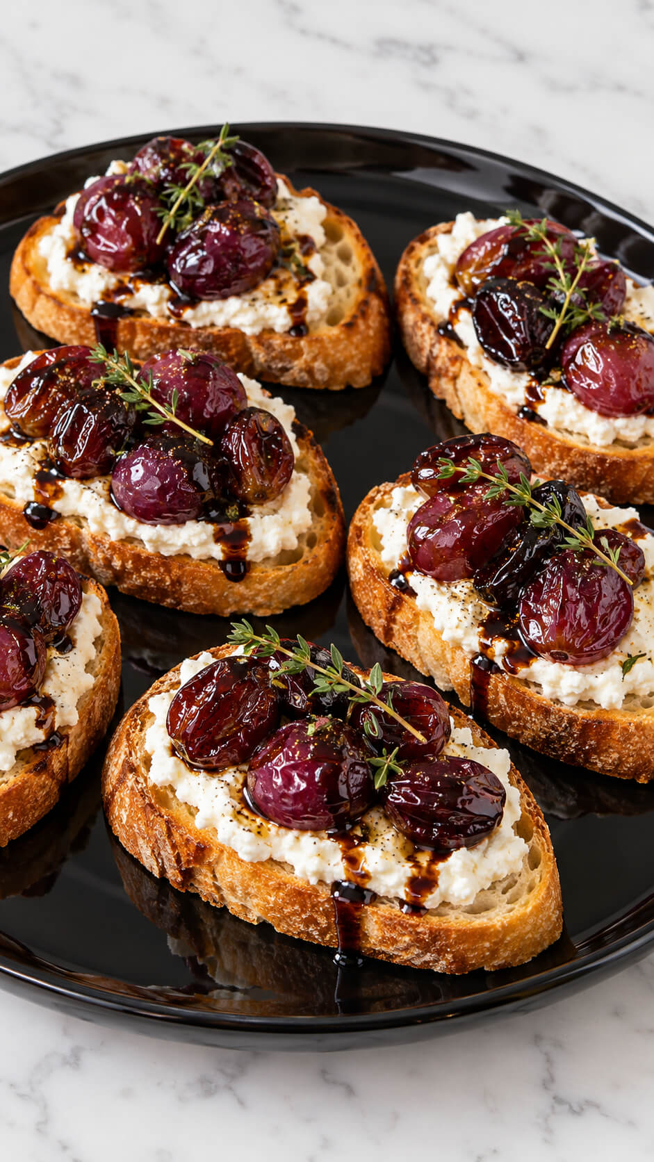 Roasted Grape and Ricotta Crostini